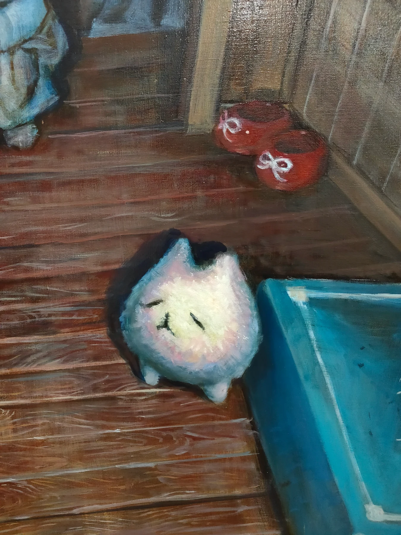 小部屋の床に座るしろいのを描いた油絵の一部